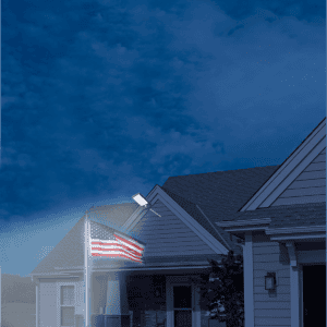 flagpole on pathway and side of the house