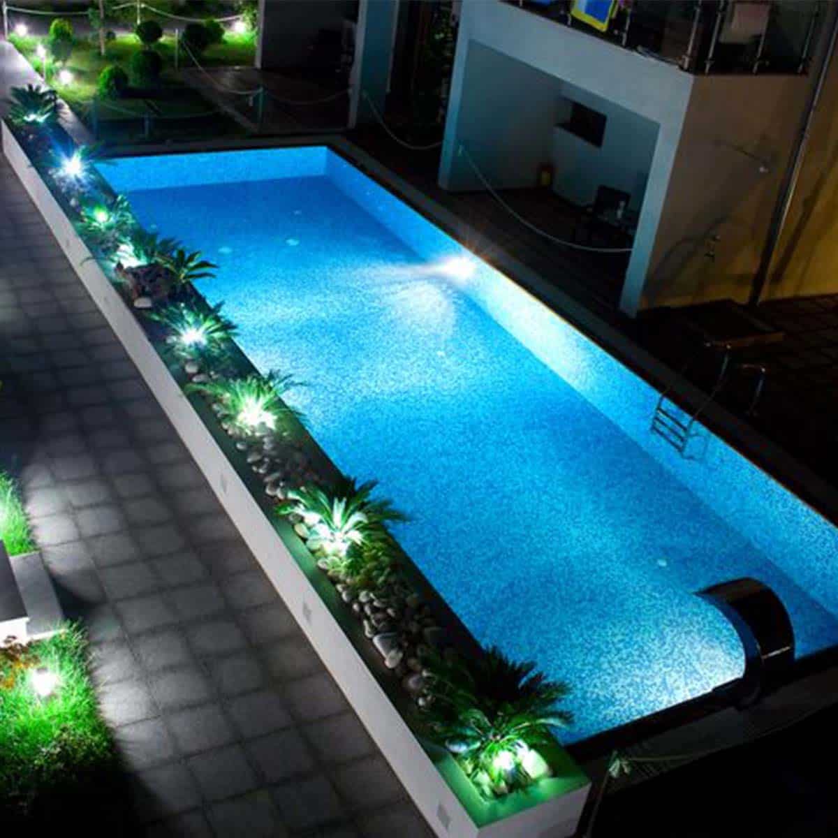 swimming pool around pathways